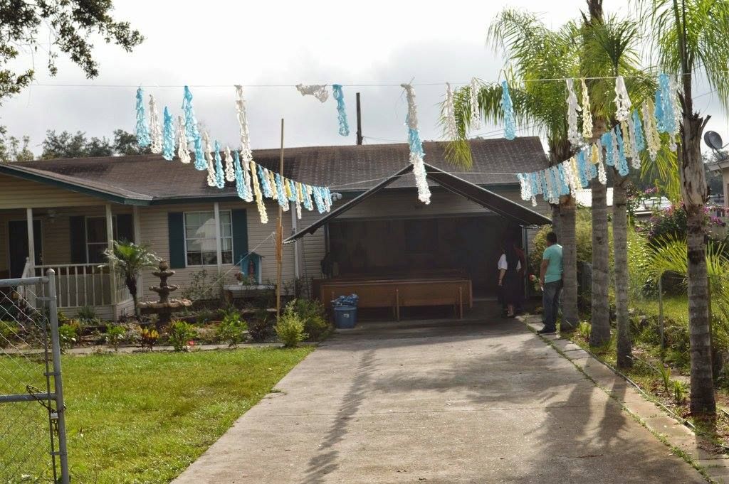 House with a garage decorated with pennants