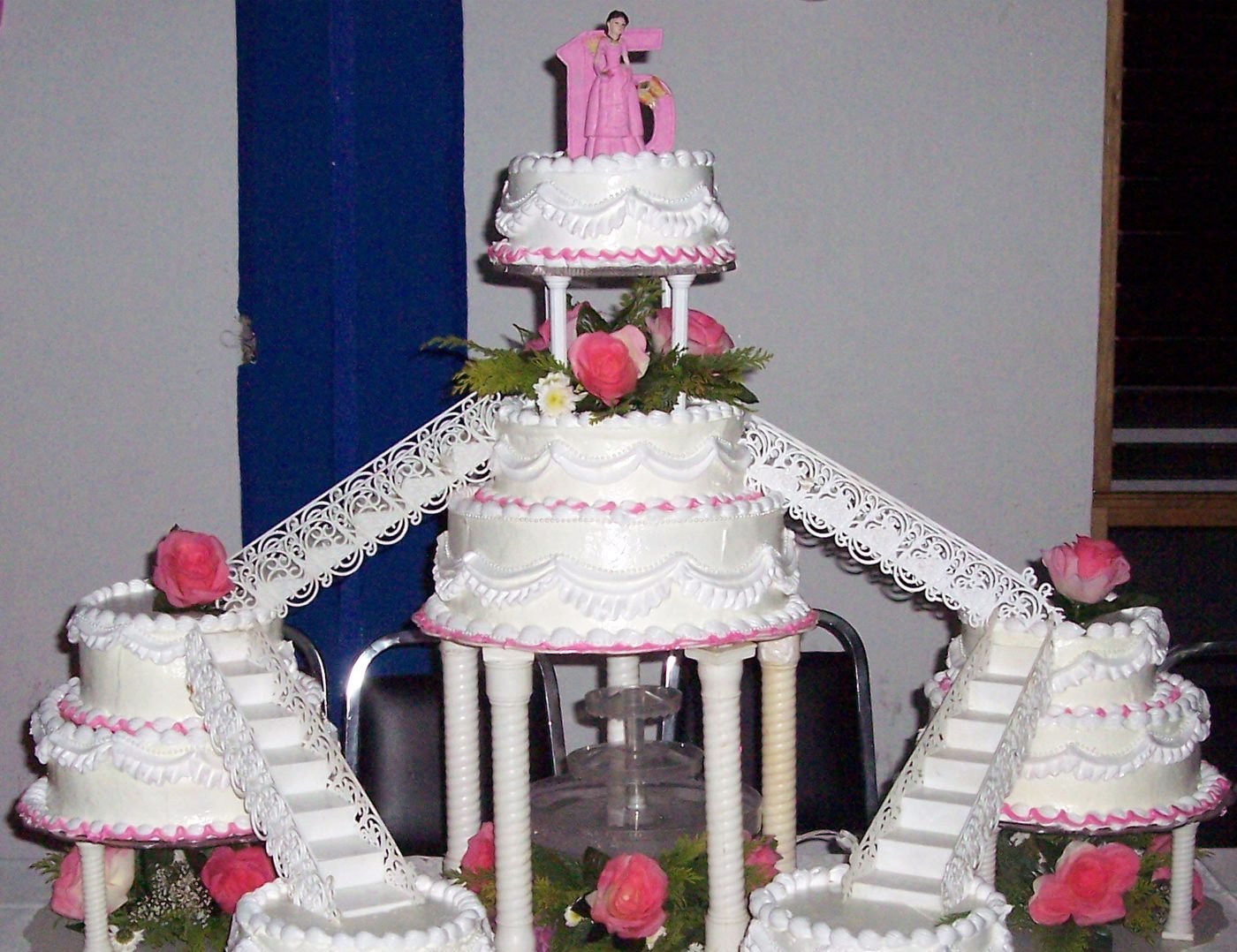 Quinceañera cake decorated with roses
